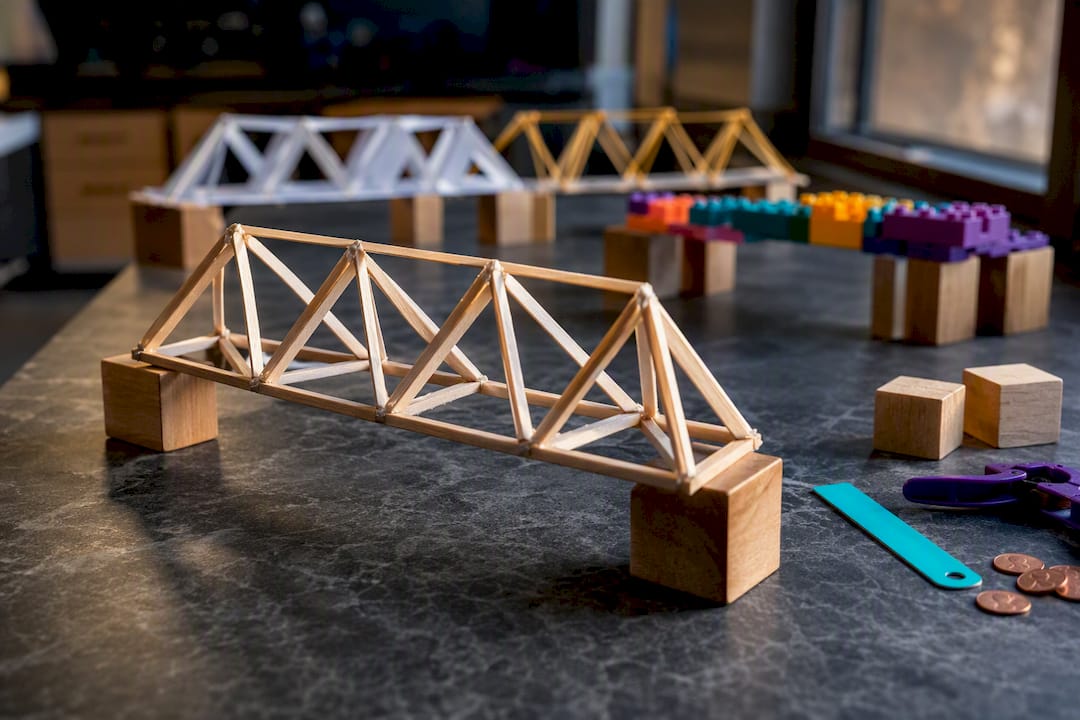 Student-built bridges across classroom supports