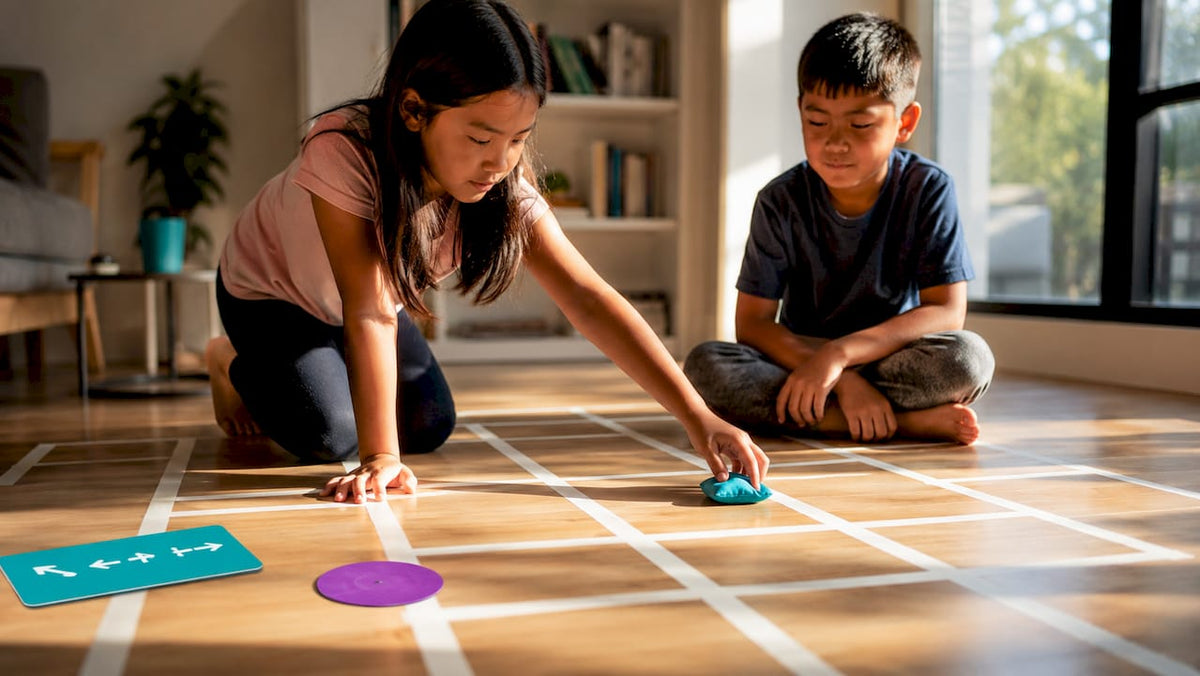 Children navigating a screen-free coding maze